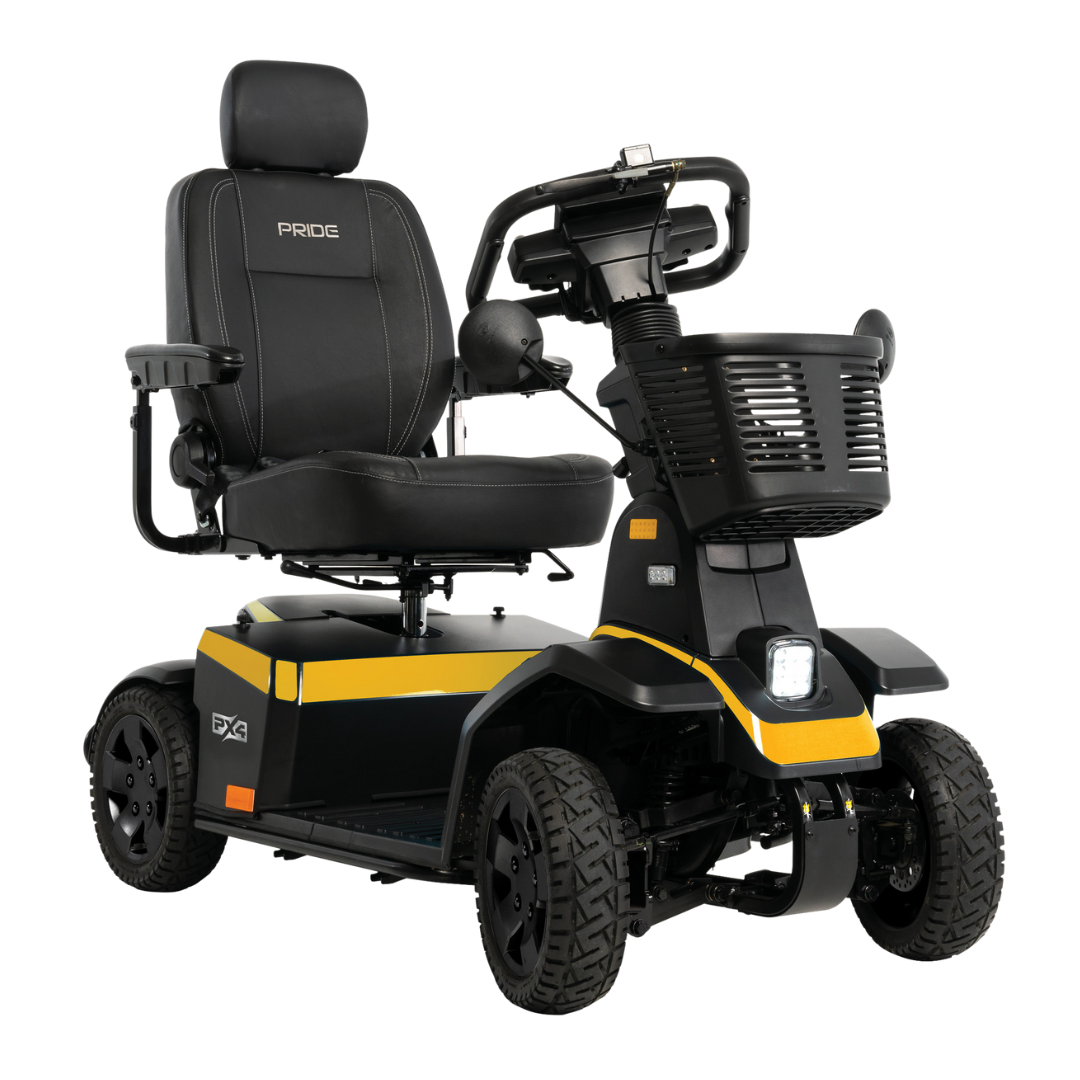 The Pride Mobility PX4 HD Bariatric Scooter features a black and yellow design, four large wheels, padded seat with headrest and armrests, handlebar control panel, front light, 500 lb weight capacity, and visible Pride branding on the seat.
